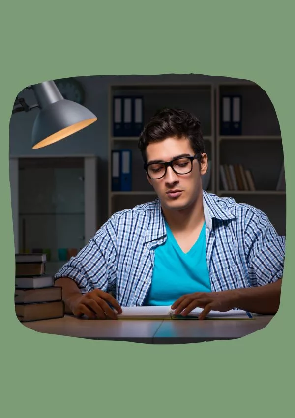 Student doing homework in a desk